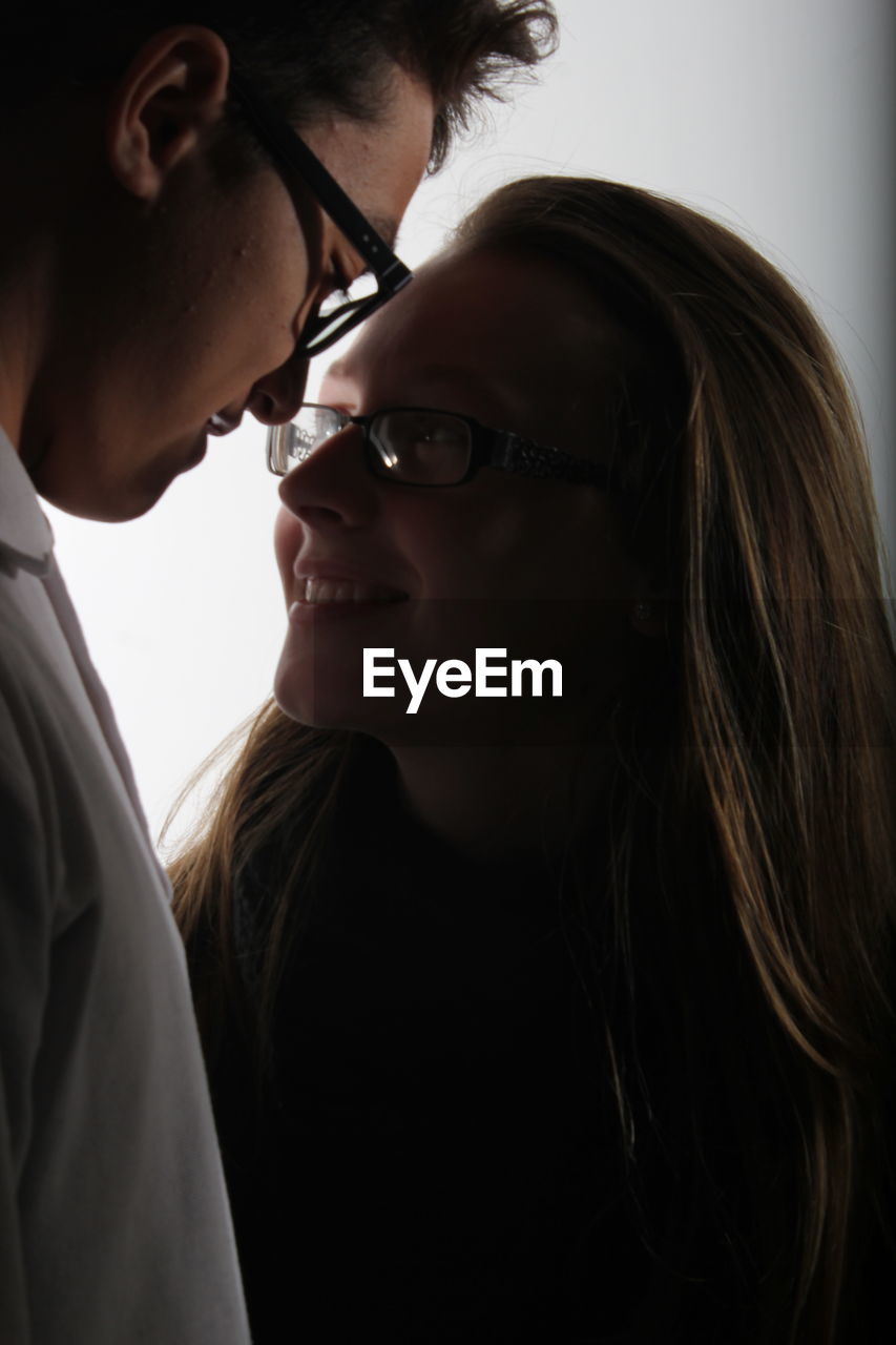 Close-up of couple romancing at home