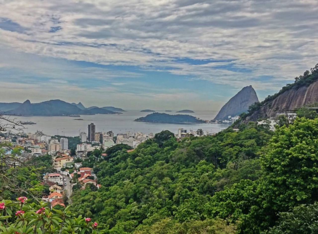 SCENIC VIEW OF MOUNTAINS AGAINST CLOUDY SKY