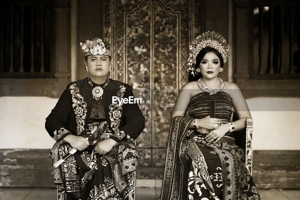 Portrait of the balinese bride sitting outdoors