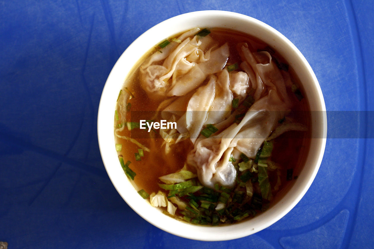 Soup in bowl on table