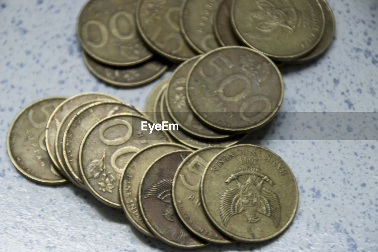 CLOSE-UP OF COINS