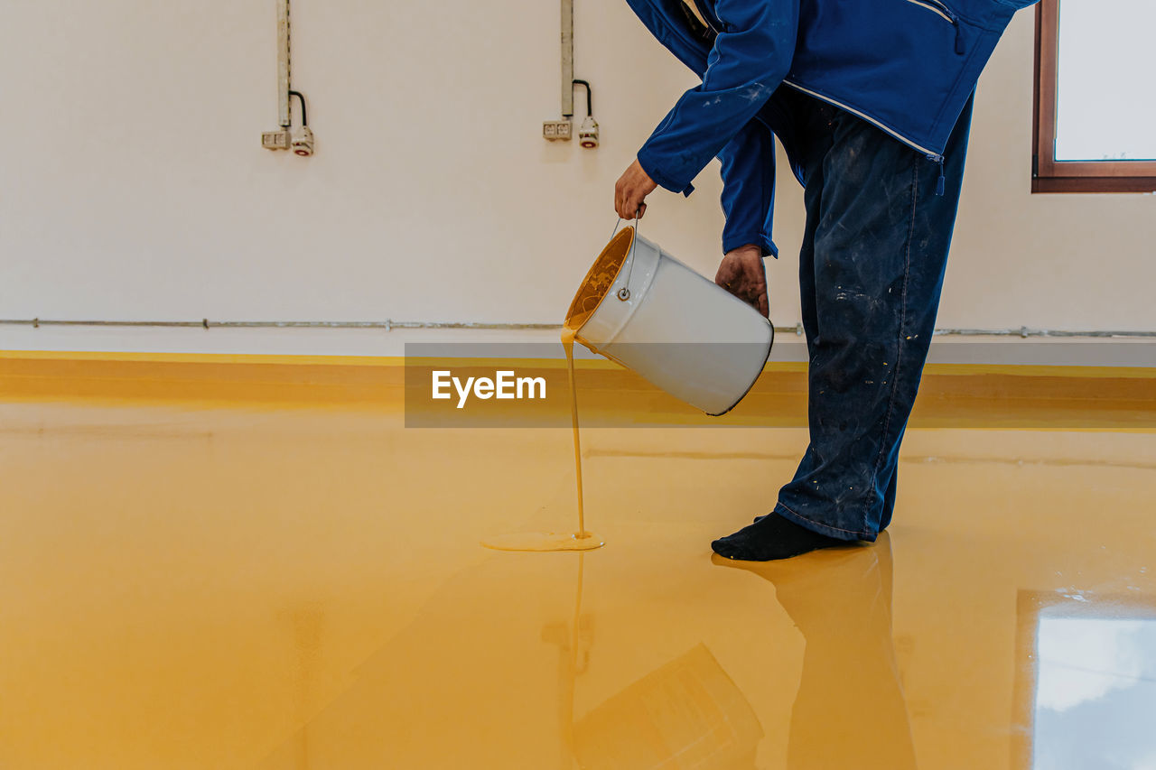 low section of woman standing on floor