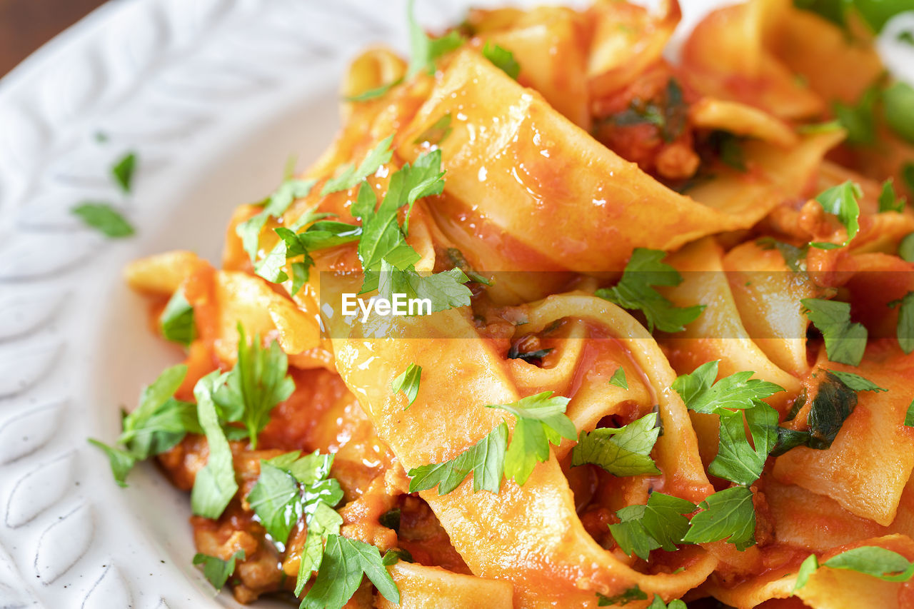 Delicious traditional italian pappardelle pasta with ragu.