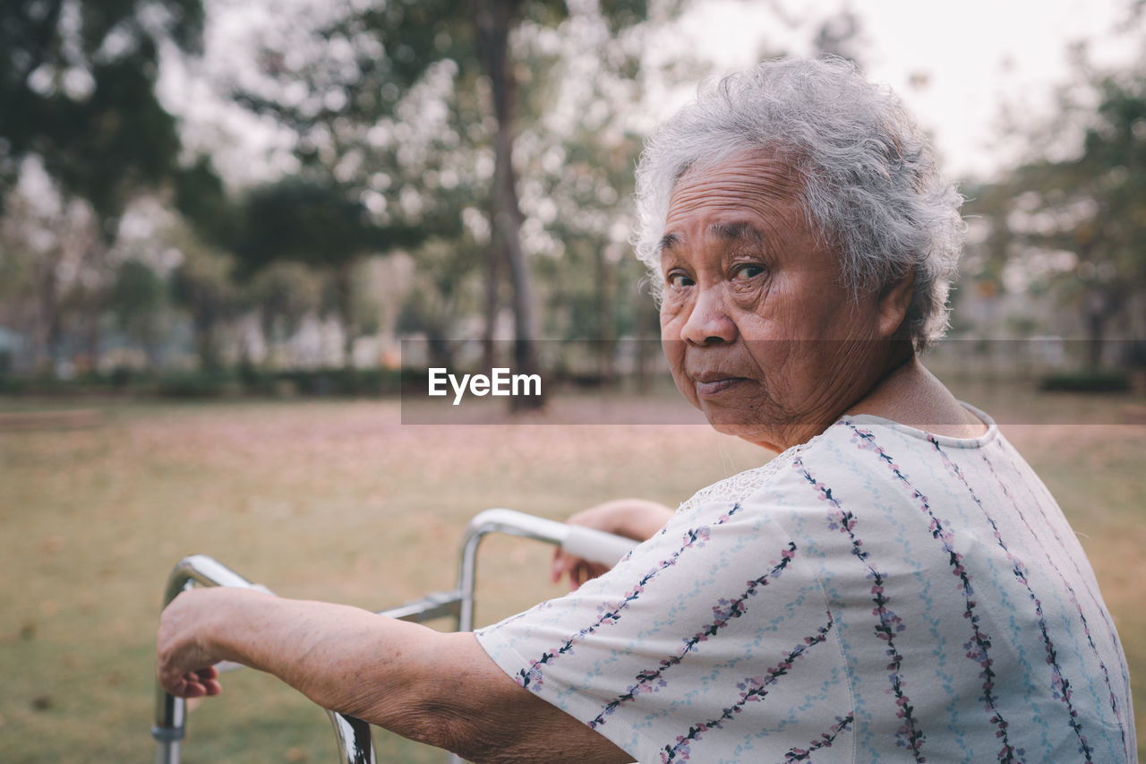 Portrait of senior woman at park