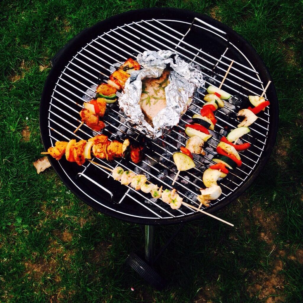 Close-up overhead view of food on barbecue grill