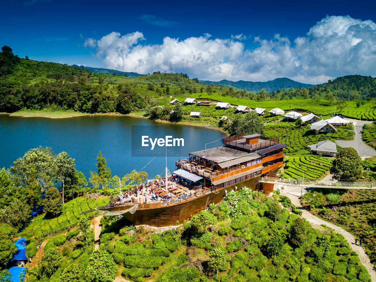 HIGH ANGLE VIEW OF TREES ON MOUNTAIN AGAINST SKY