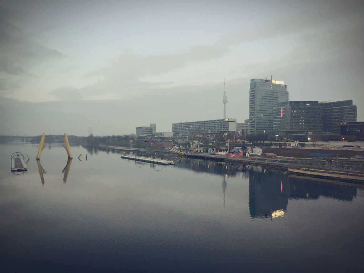 REFLECTION OF CLOUDS IN RIVER