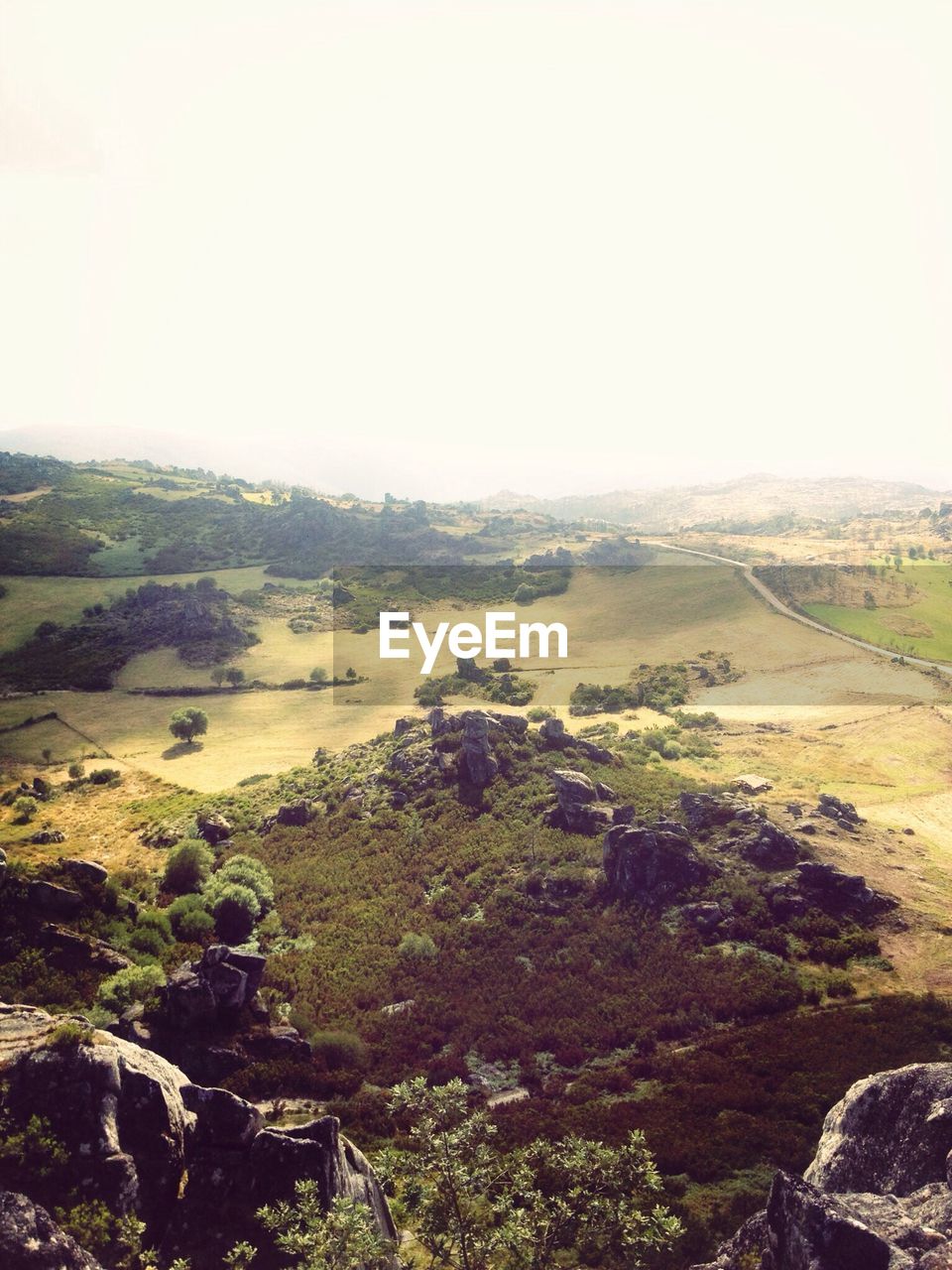 High angle shot of countryside landscape against clear sky