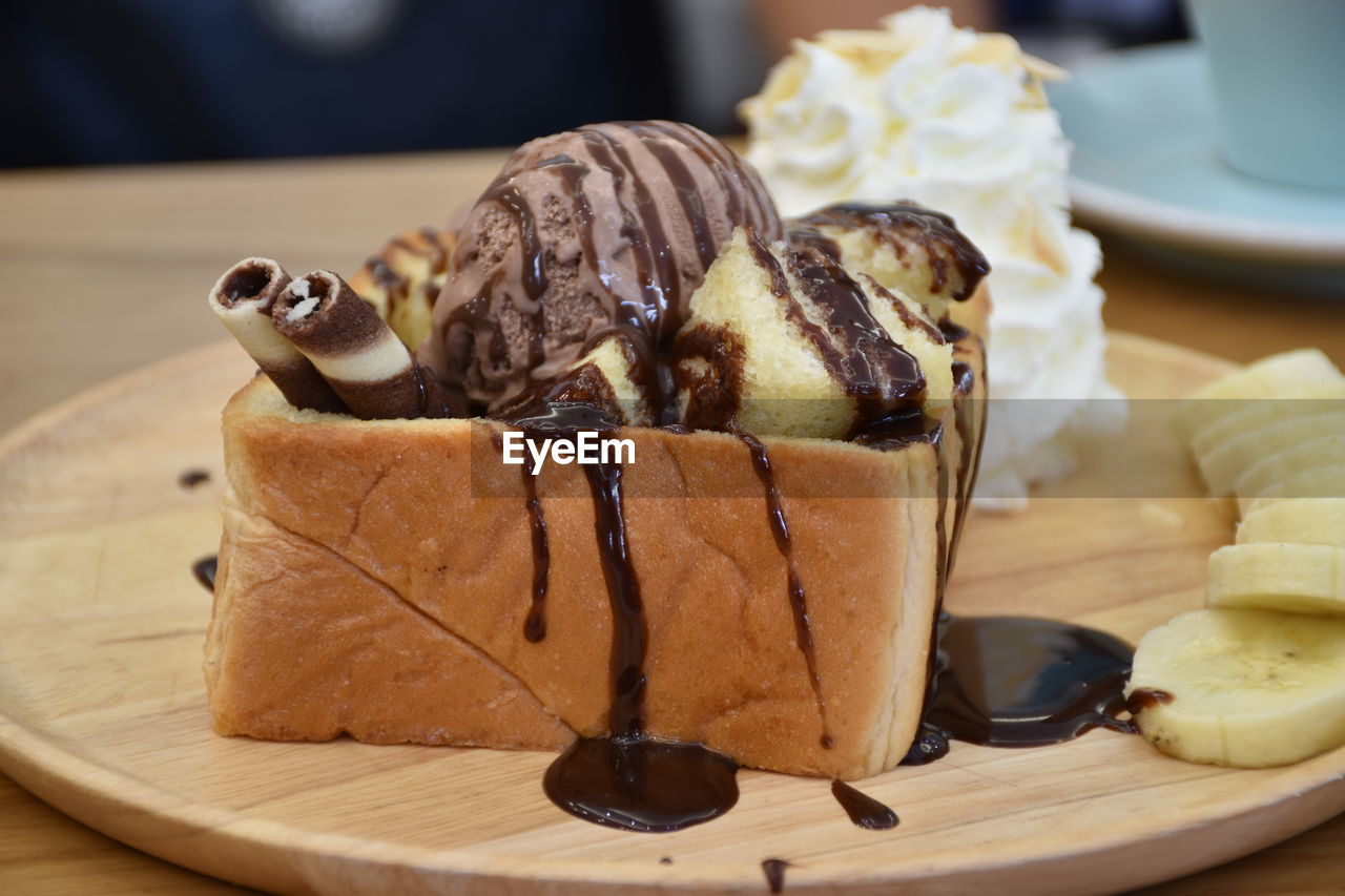 Close-up of dessert with fruits in restaurant