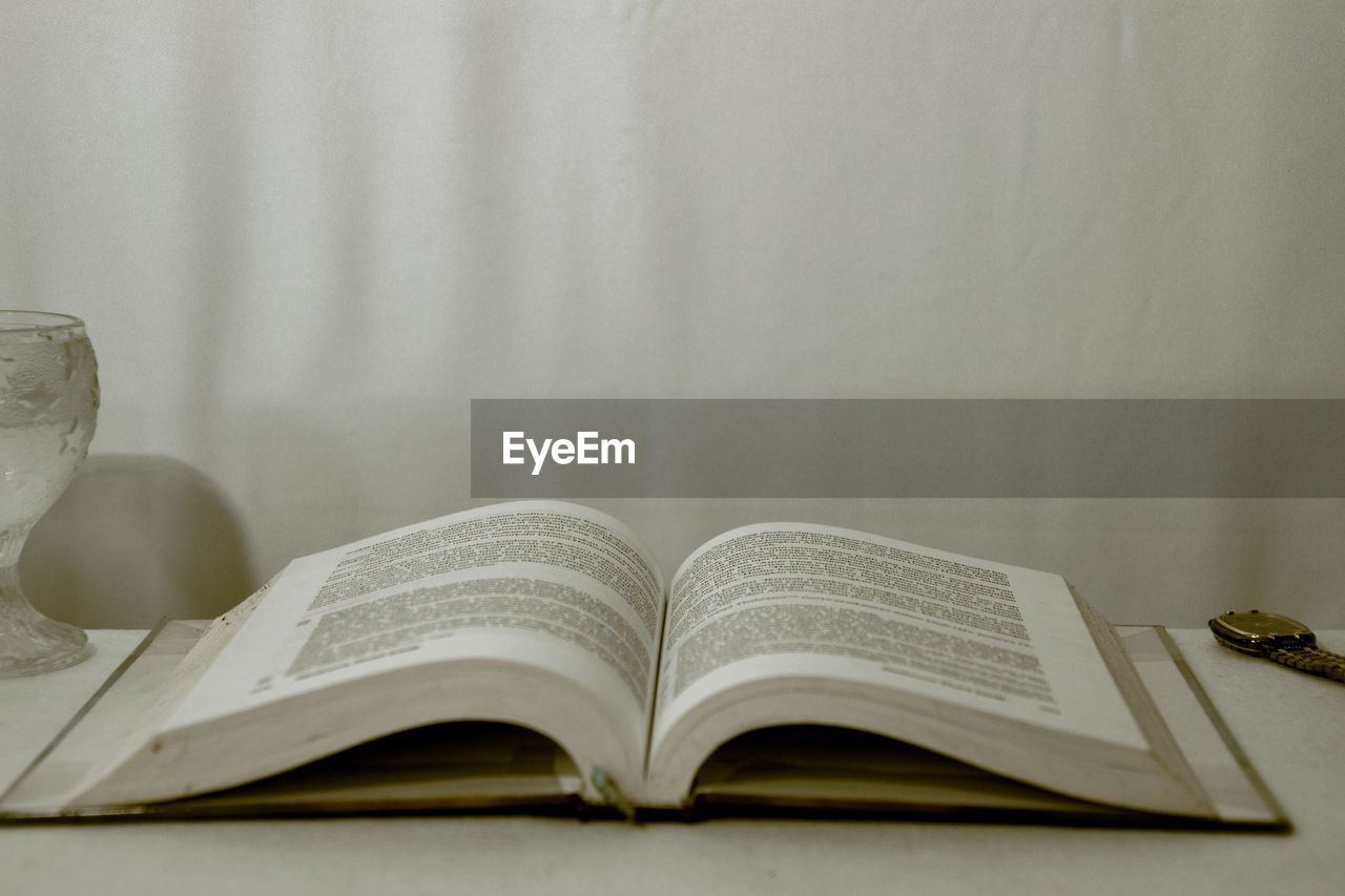 Close-up of open book on table