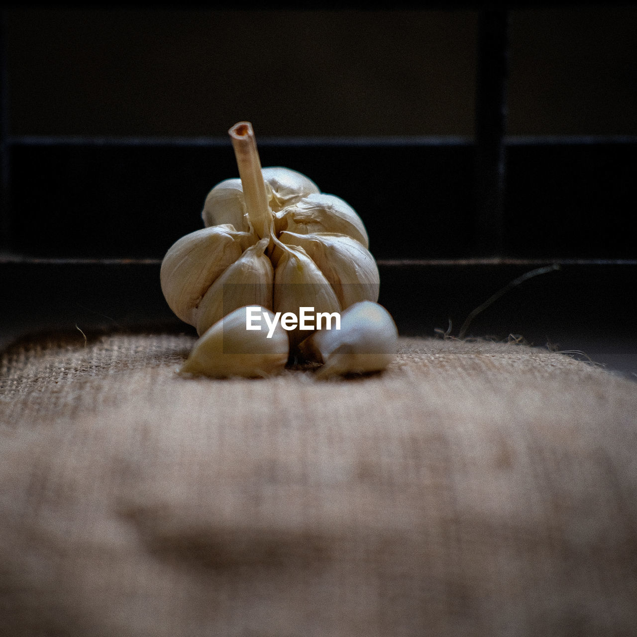 CLOSE-UP OF BREAD ON WOODEN TABLE