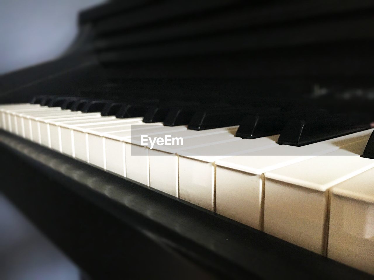 CLOSE-UP OF PIANO KEYS AT NIGHTCLUB