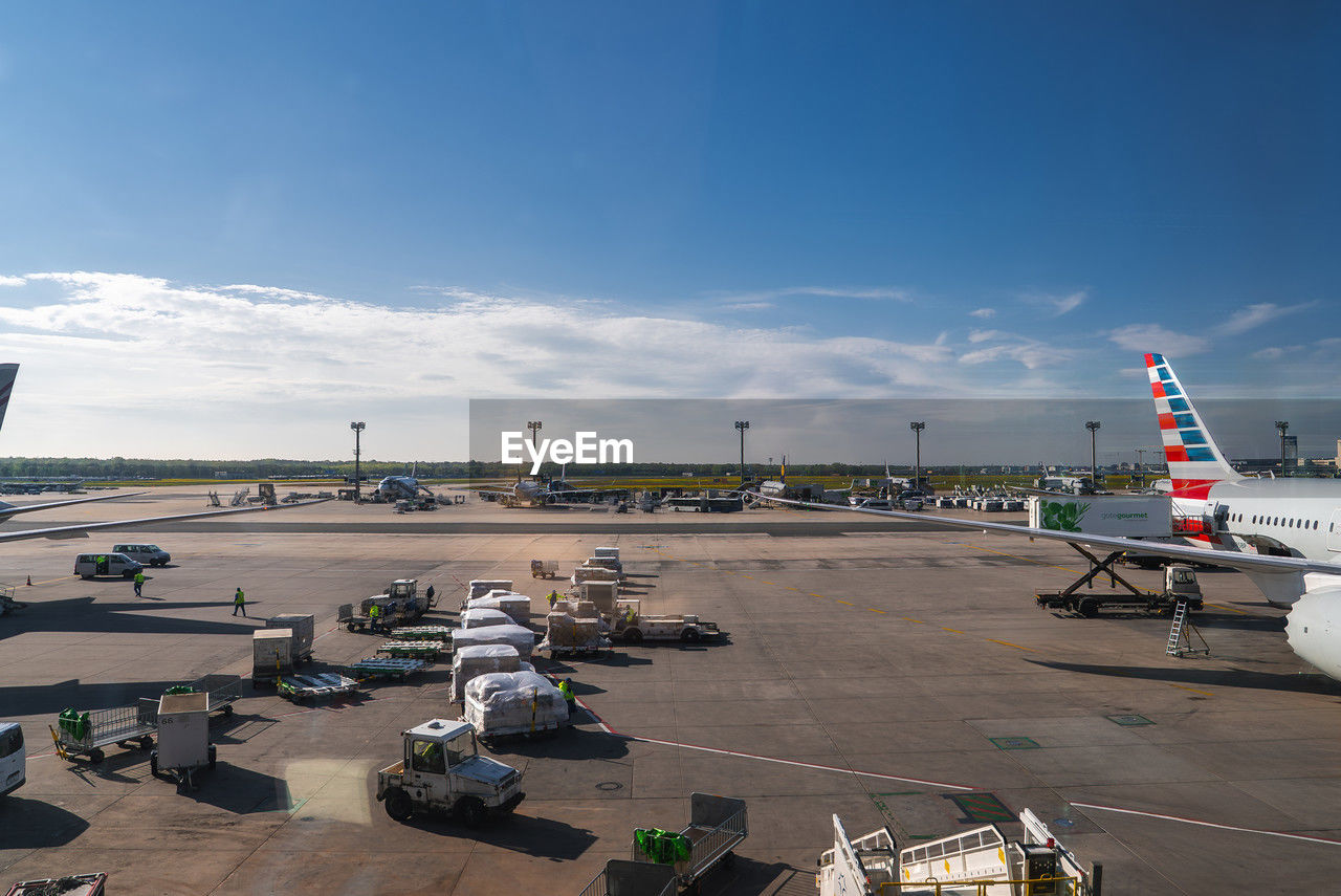 transportation, mode of transportation, air vehicle, airplane, sky, airport, airport runway, travel, aviation, nature, infrastructure, vehicle, cloud, day, aircraft, architecture, outdoors, water, tarmac, travel destinations, no people