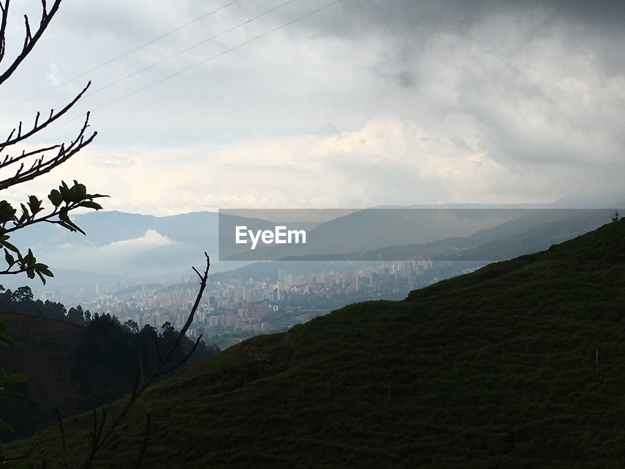 SCENIC VIEW OF MOUNTAINS AGAINST SKY DURING FOGGY WEATHER