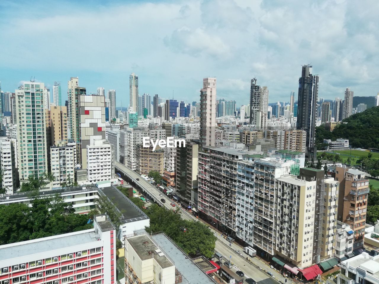 High angle view of buildings in city against sky