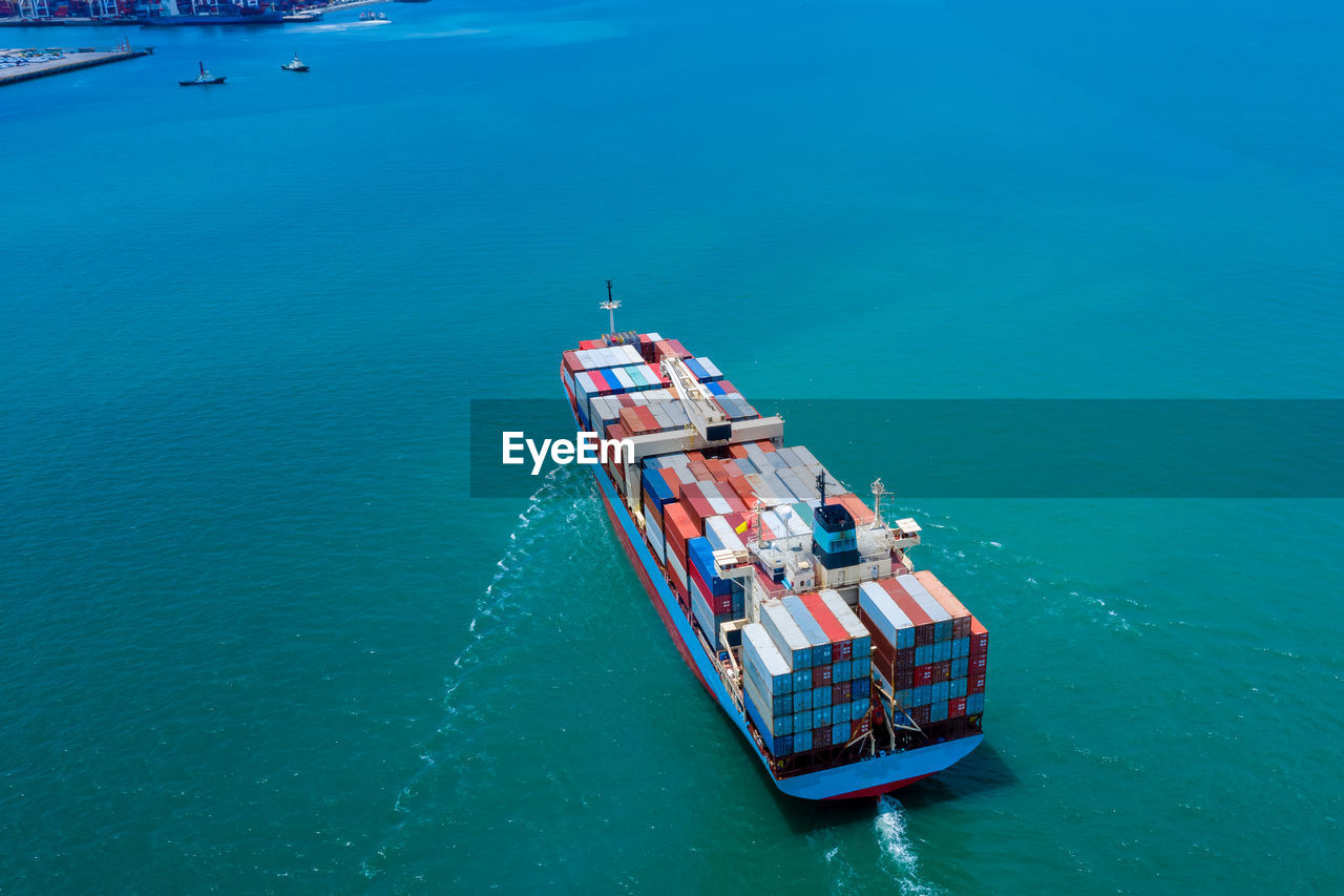 Industry business service logistics cargo containers ship import export by the sea camera from drone 