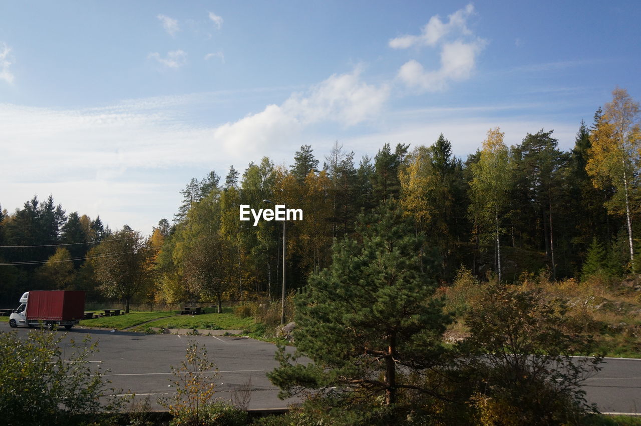 Scenic view of landscape against cloudy sky