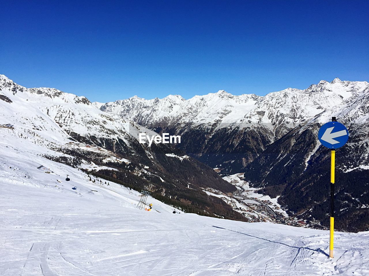 Snowcapped mountains against clear sky