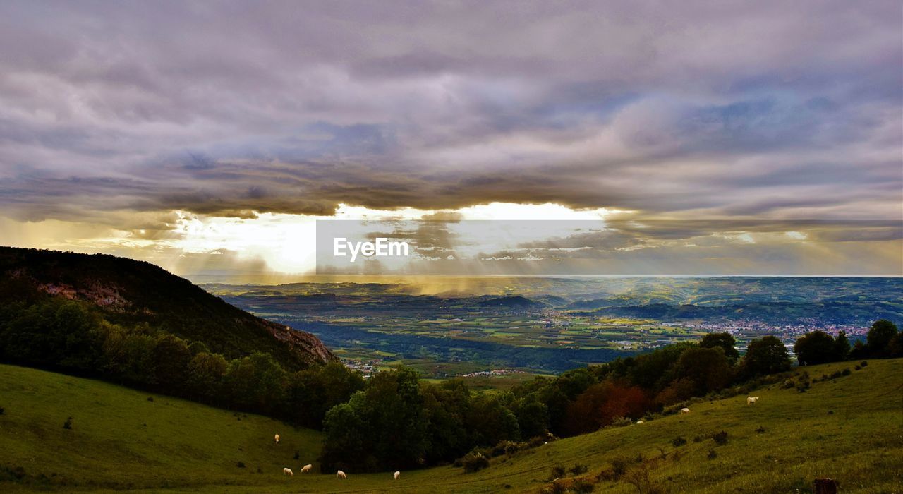 VIEW OF LANDSCAPE AGAINST CLOUDY SKY