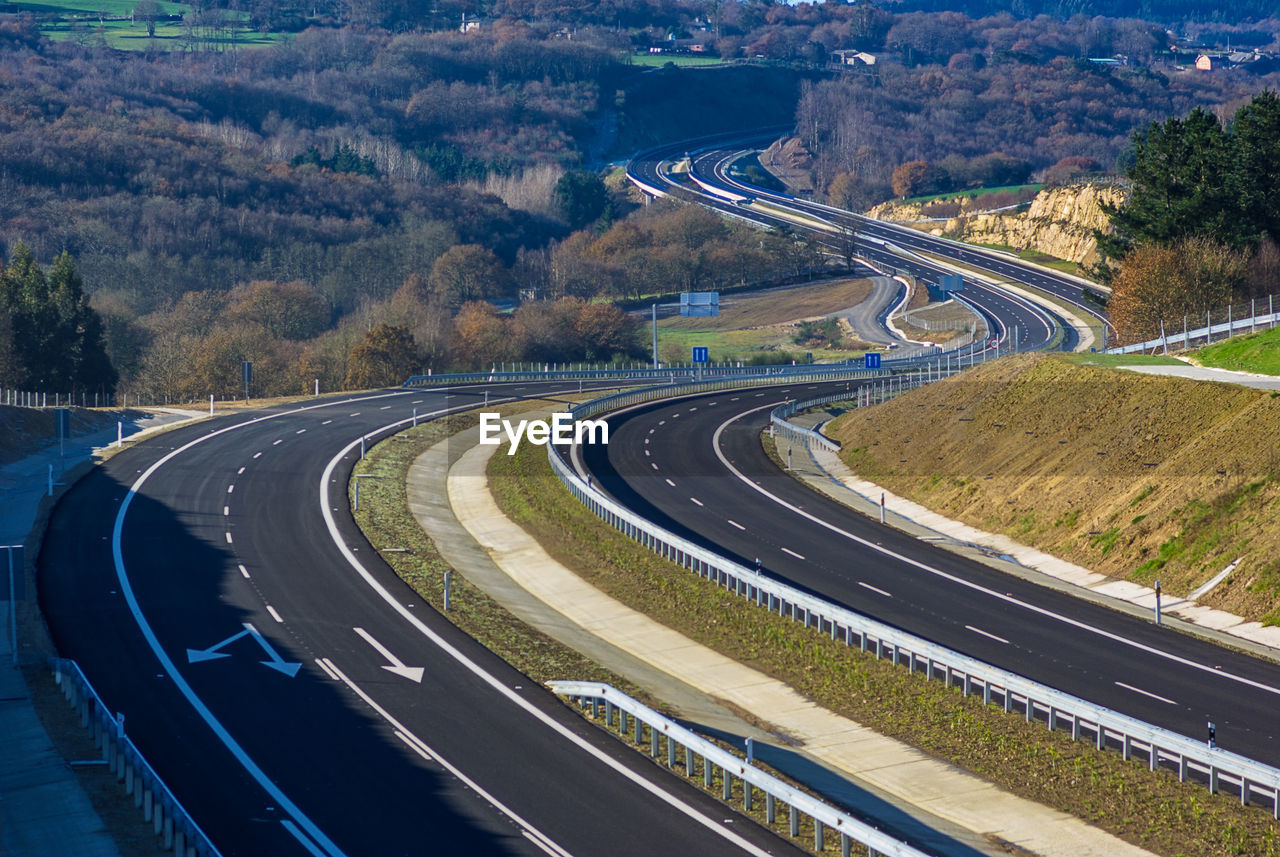 High angle view of empty highway passing through countryside