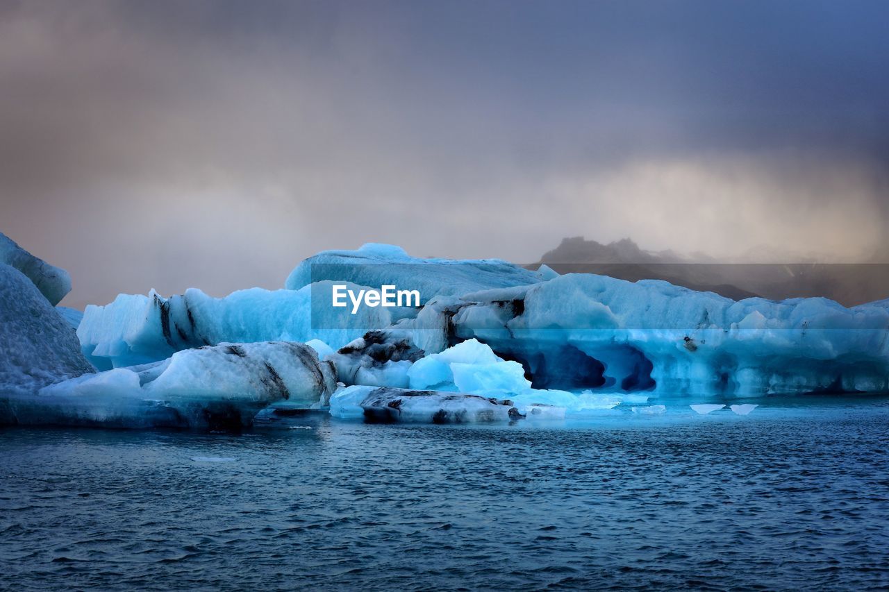 Scenic view of sea against sky during winter