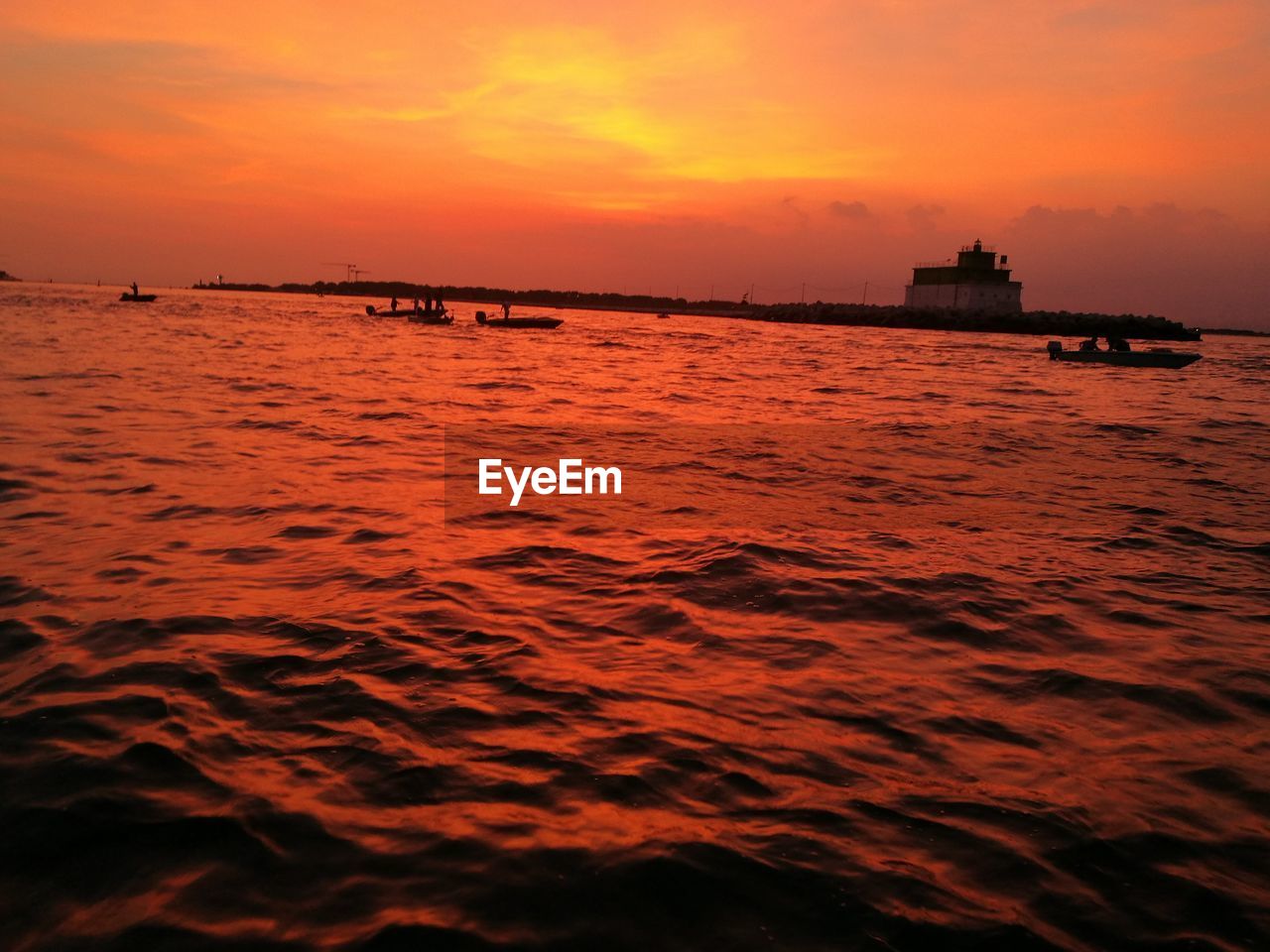 SCENIC VIEW OF SEA DURING SUNSET