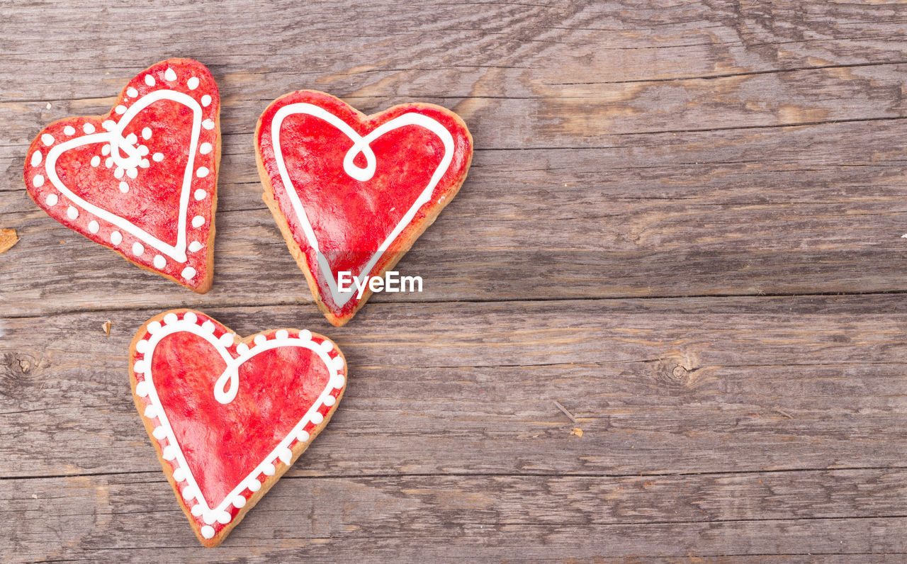 High angle view of heart shape gingerbread cookies on table
