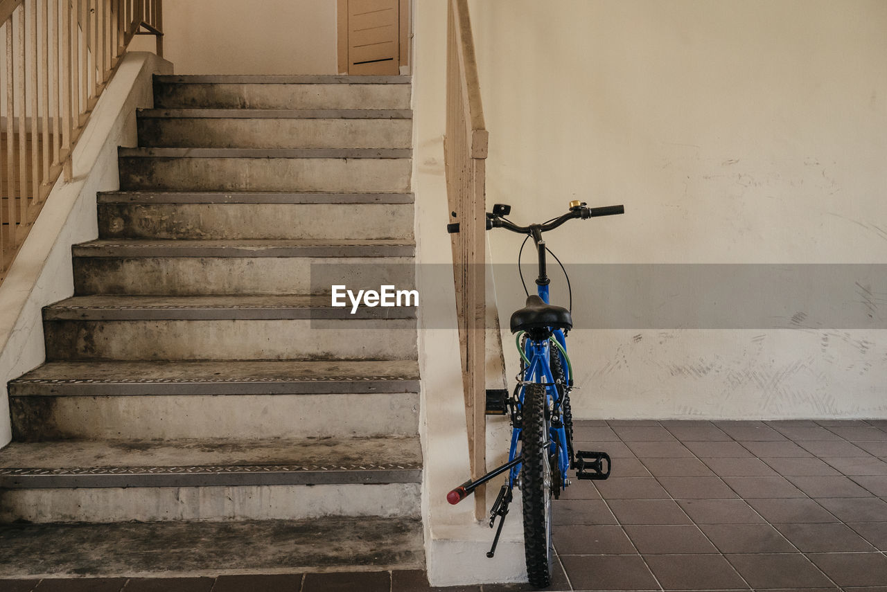 Bicycle by steps in building