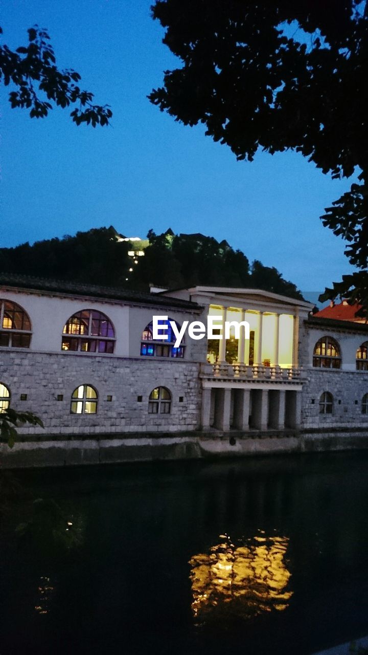 Historic building reflecting in canal