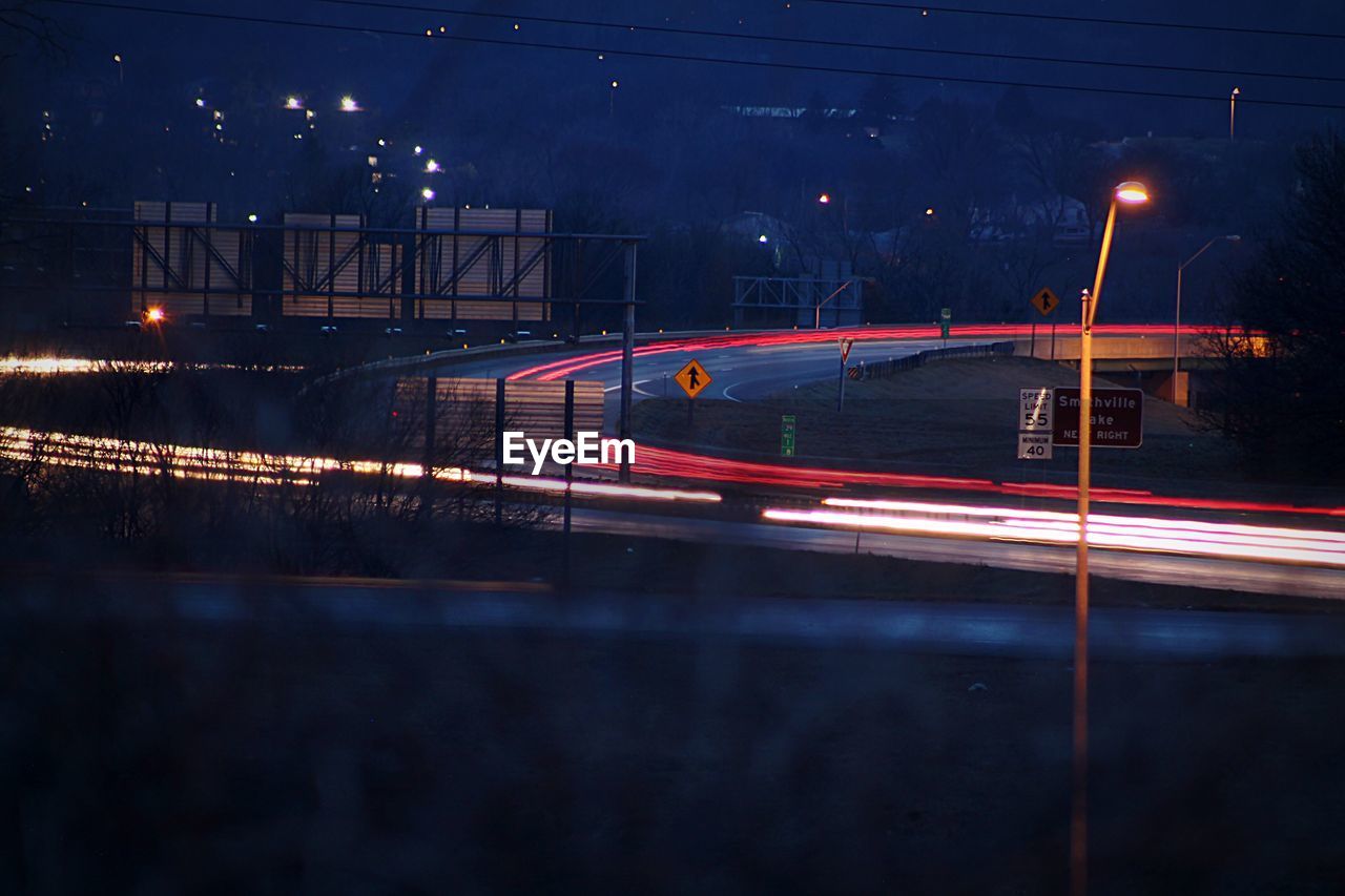 Illuminated light trails in city