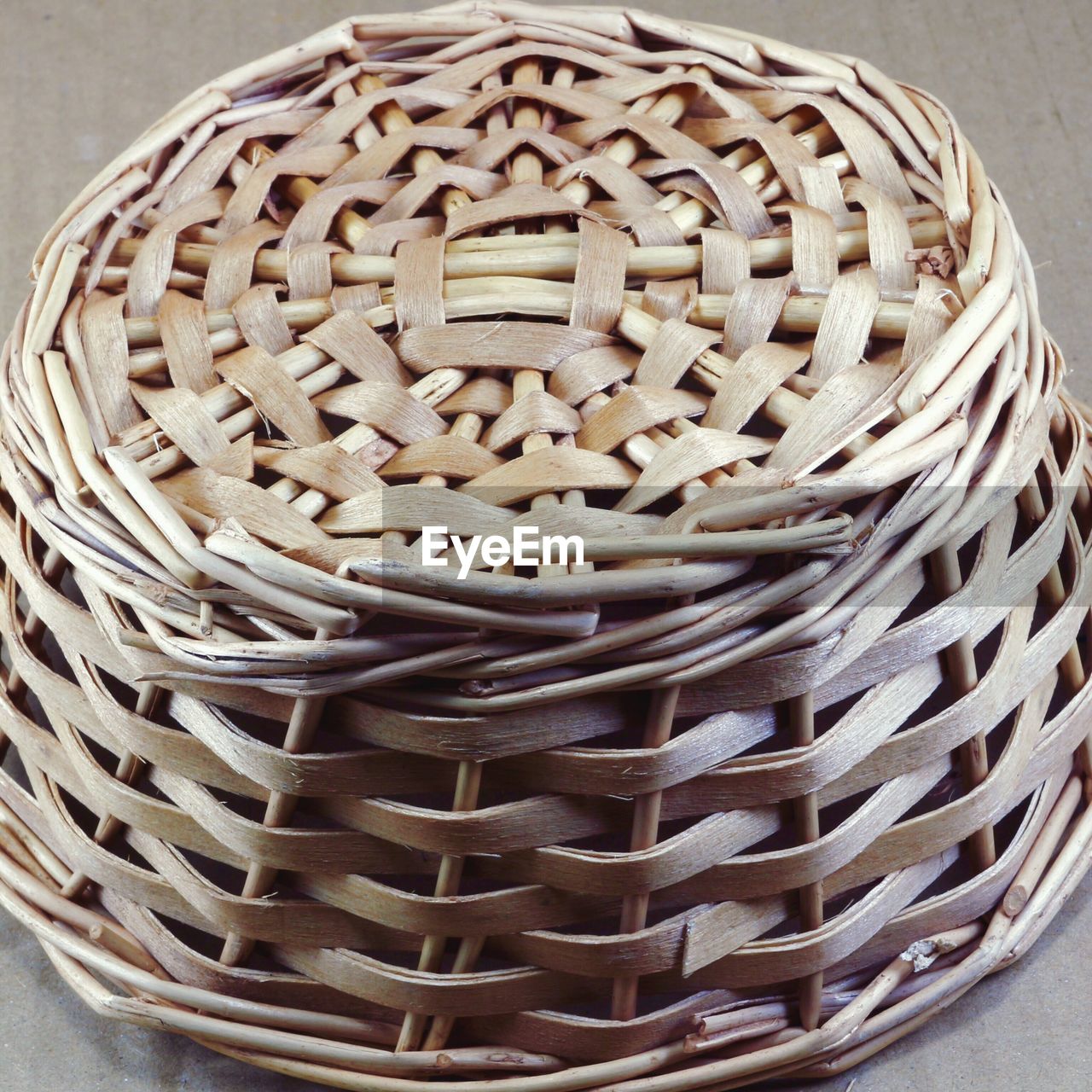 Close-up of whicker basket on table