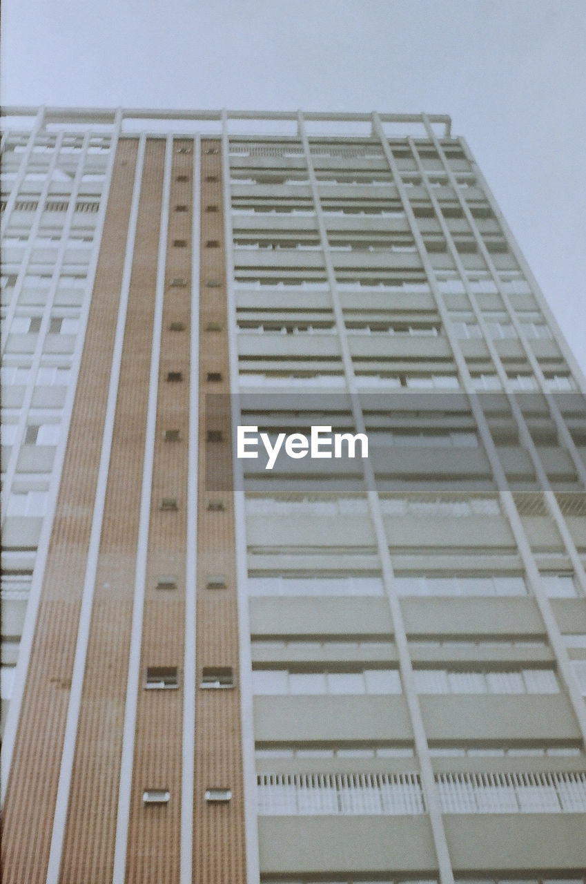 Low angle view of modern building against sky