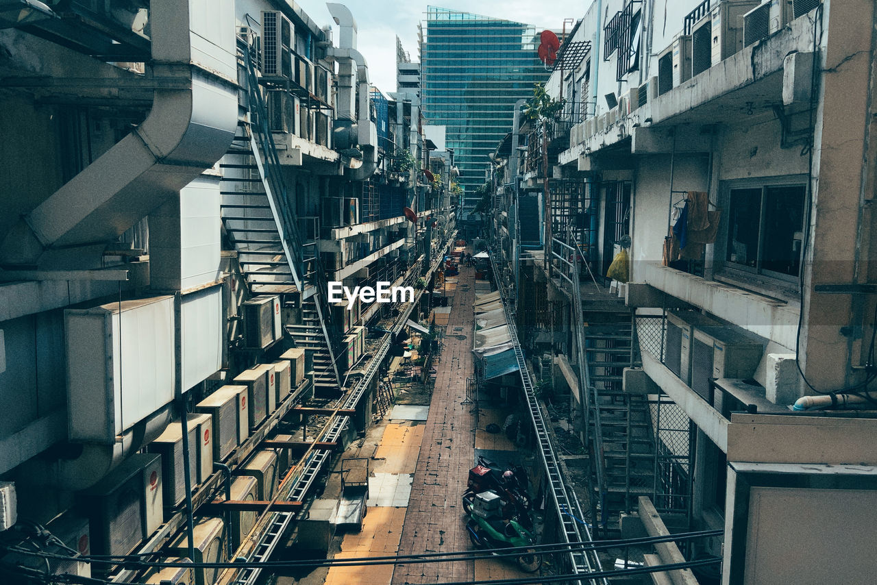 High angle view of railroad tracks amidst buildings in city