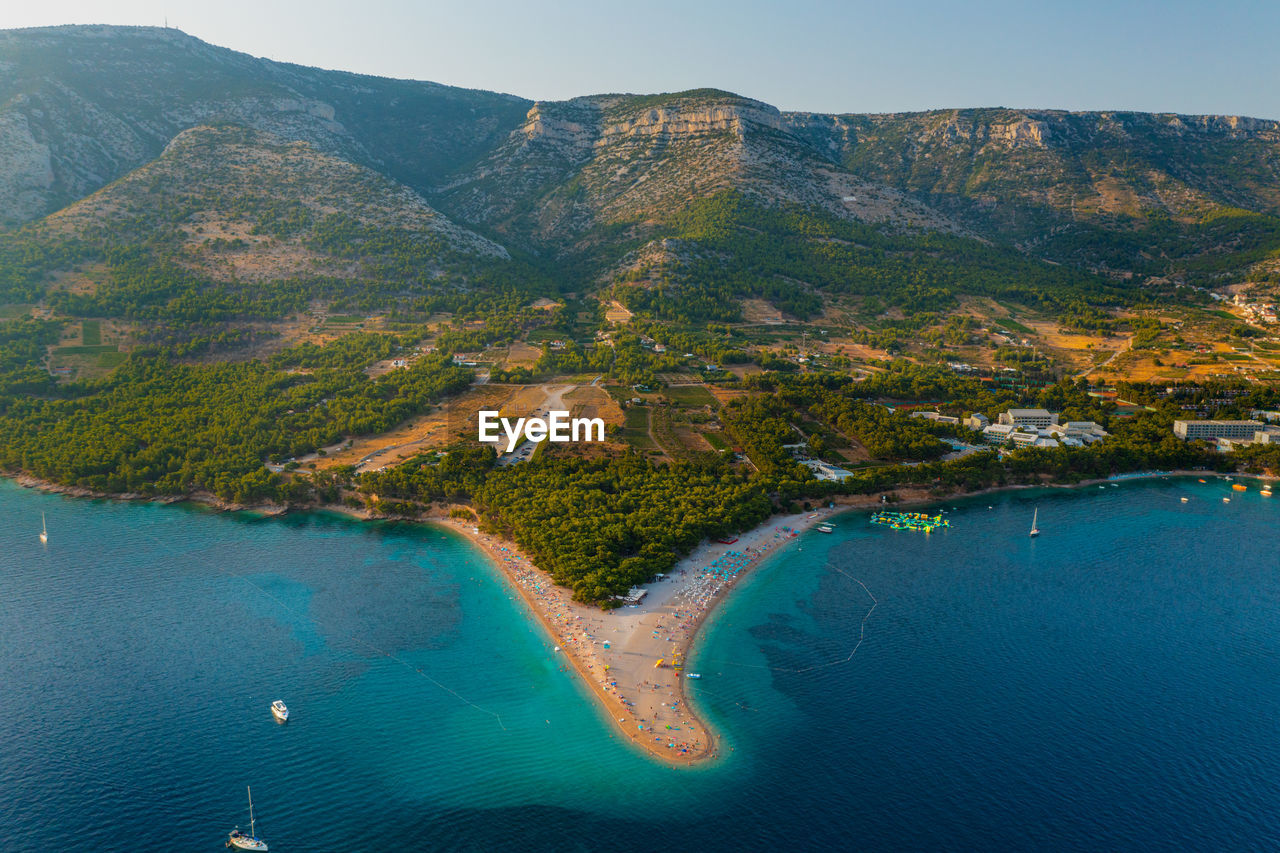 Aerial scene of zlatni rat beach on brac island, croatia