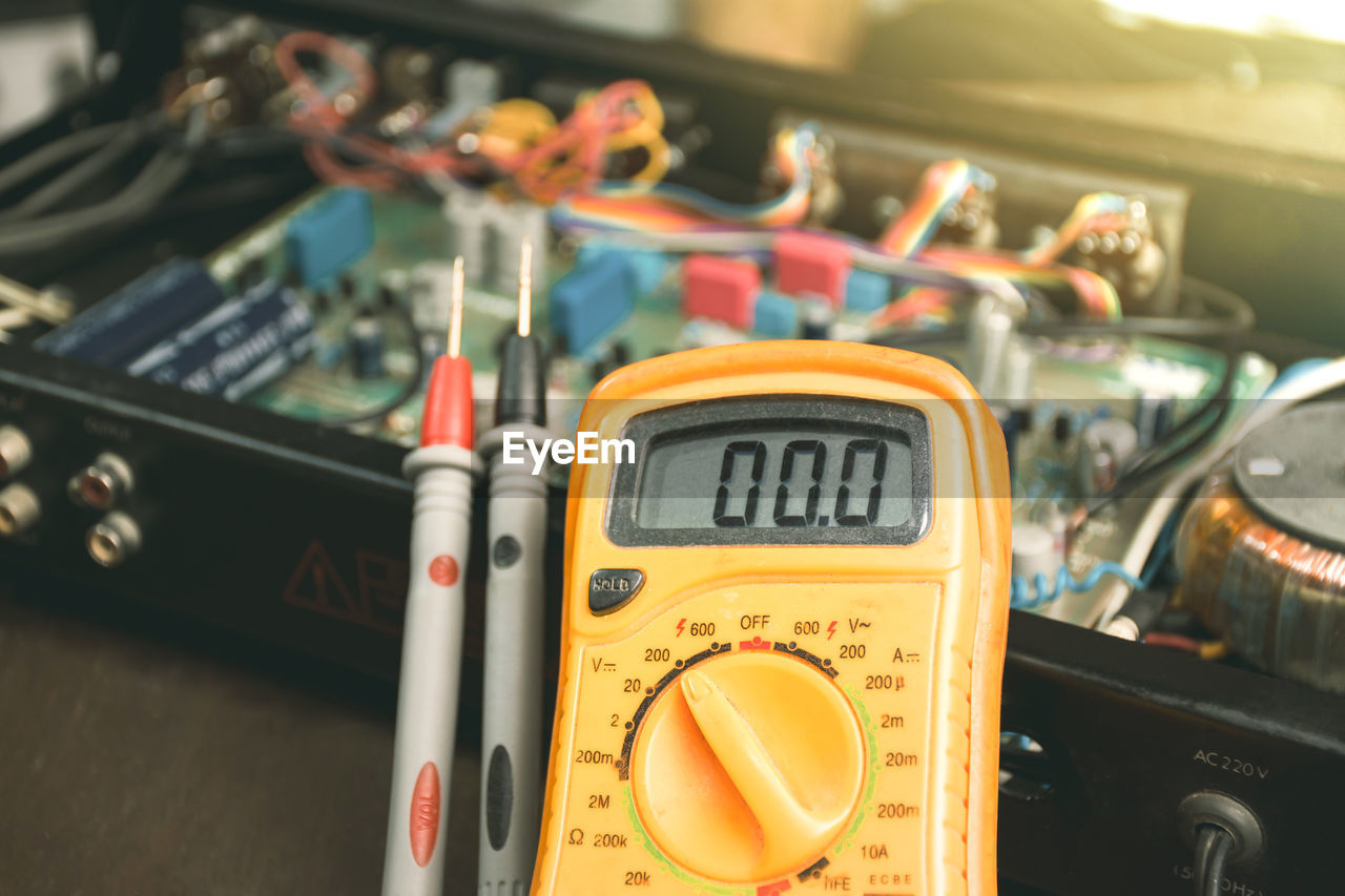 Digital multimeter and probe with a set zero on display for checking voltage stable