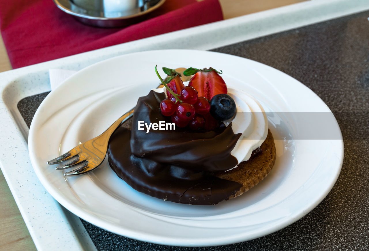 Close-up of cake in plate on table