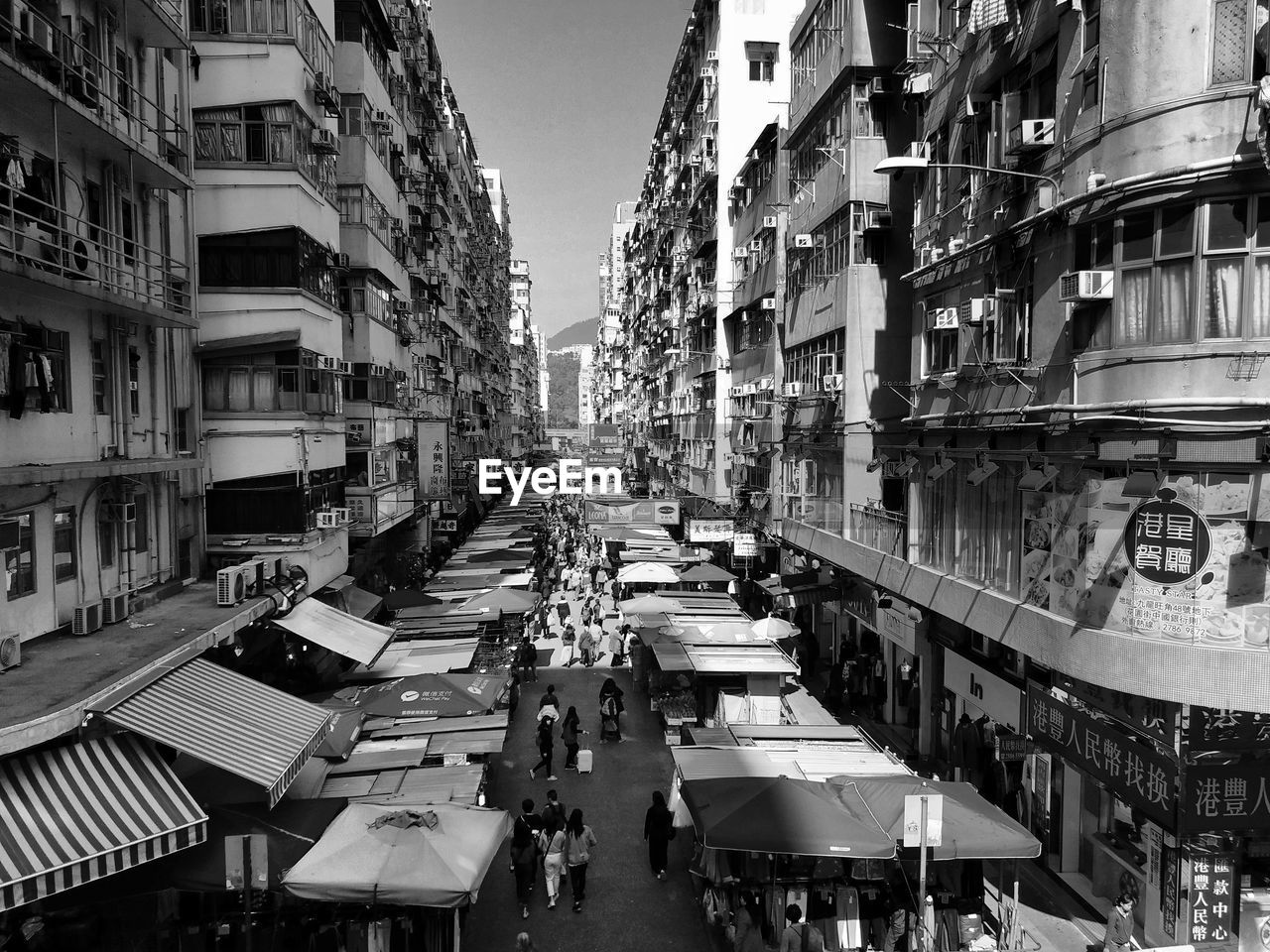 High angle view of street amidst buildings