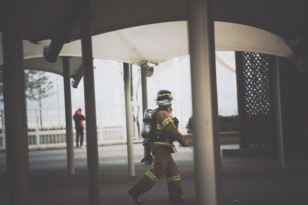 Firefighter walking in building