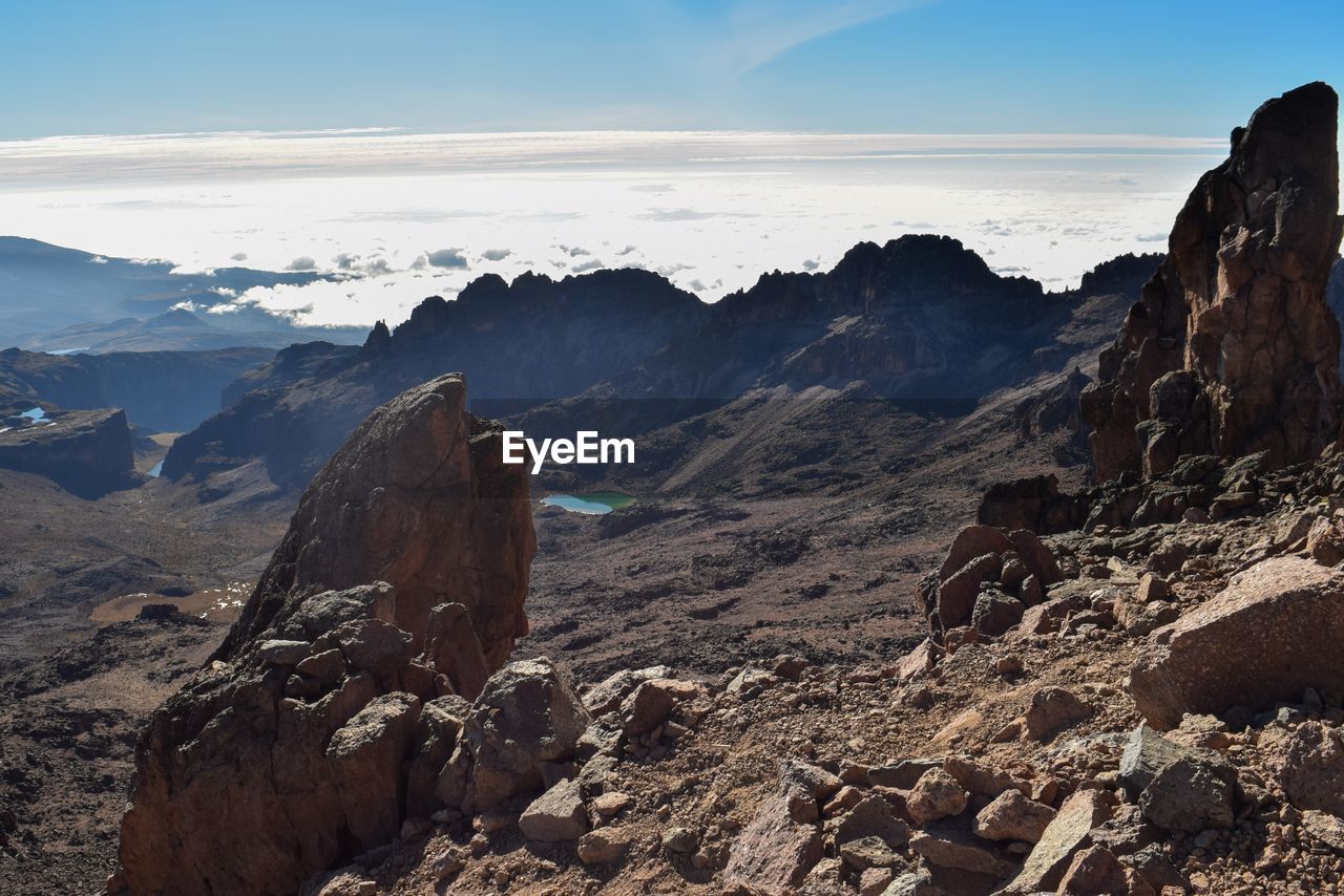 Volcanic rock formations above the clouds at mount kenya, kenya