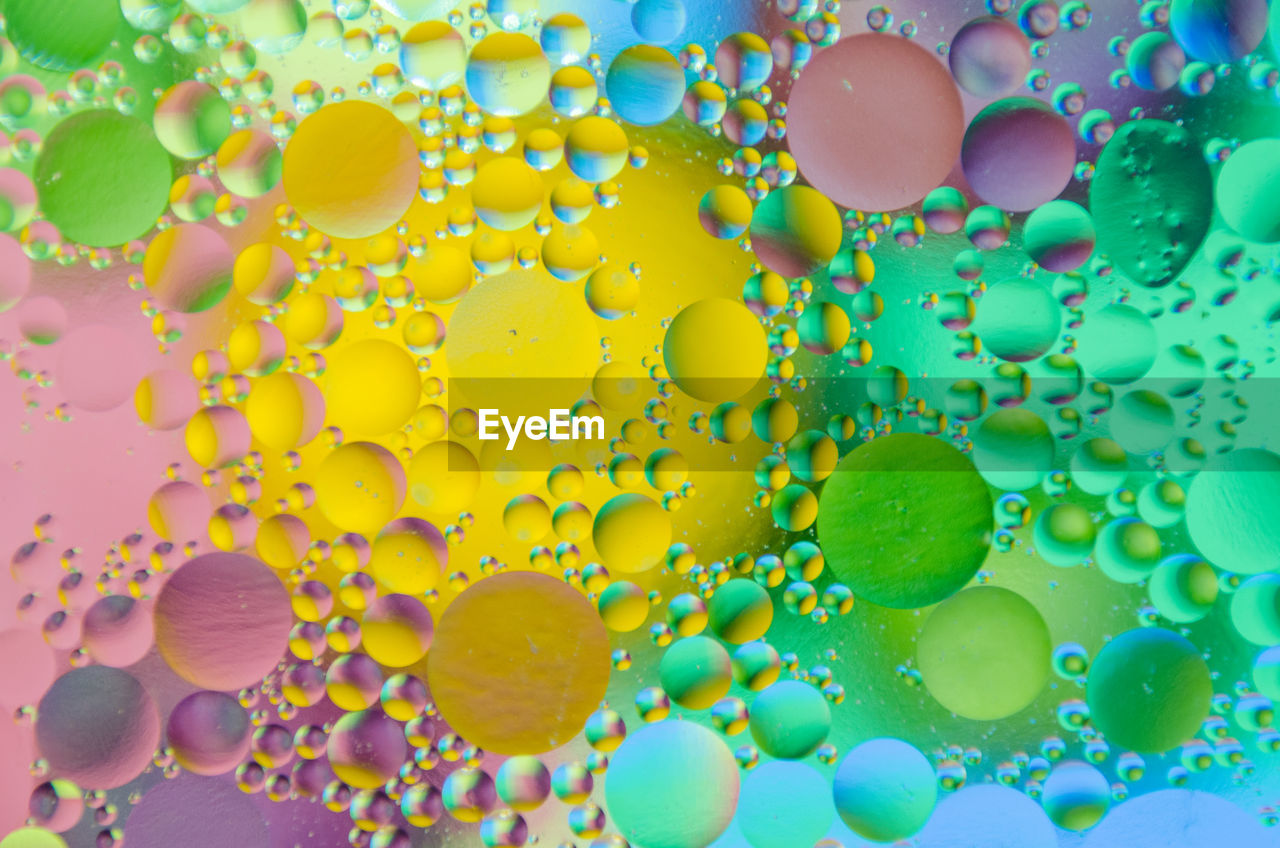 Close-up of colorful bubbles in water