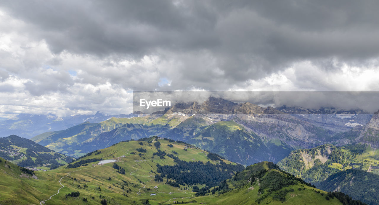 SCENIC VIEW OF MOUNTAIN AGAINST SKY