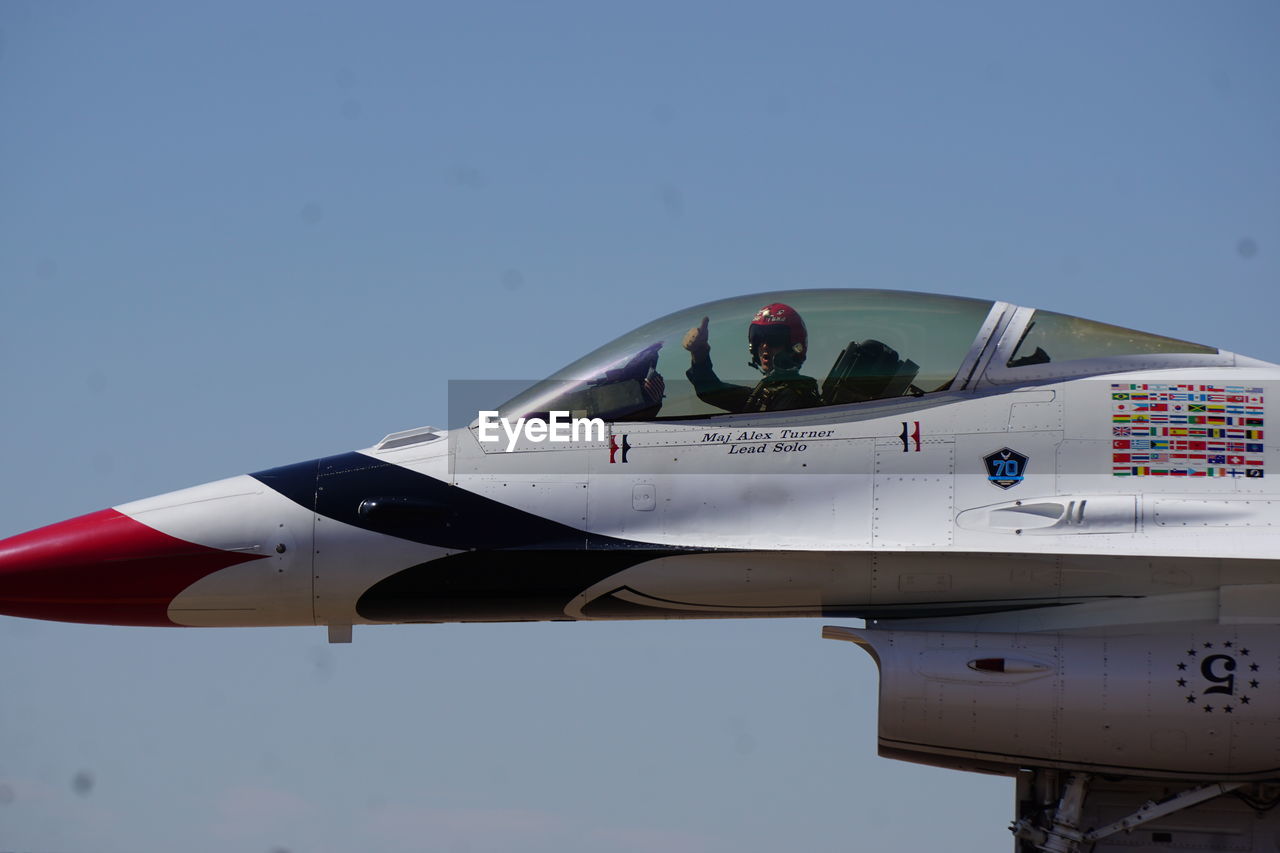 CLOSE-UP OF AIRPLANE IN SKY