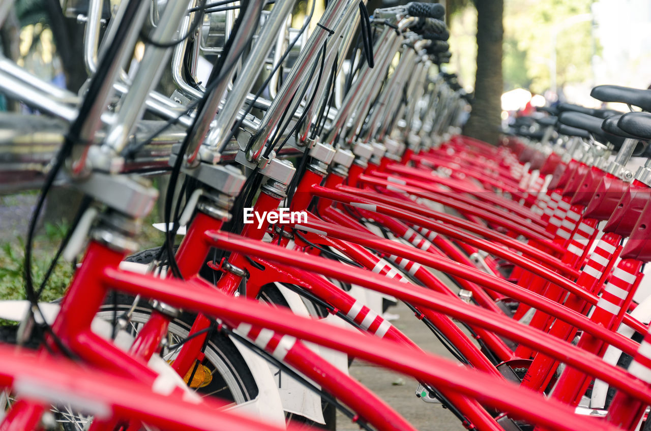 Red bicycles in parking lot