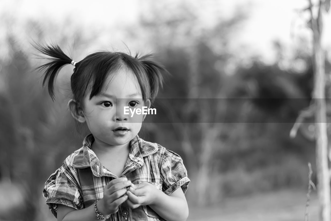 Cute girl playing in playground