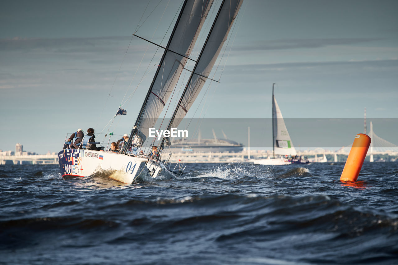 sailboat sailing in sea