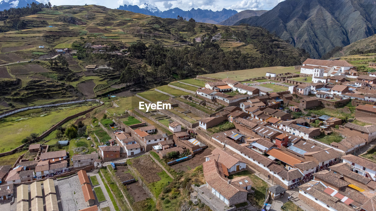 high angle view of townscape and mountains