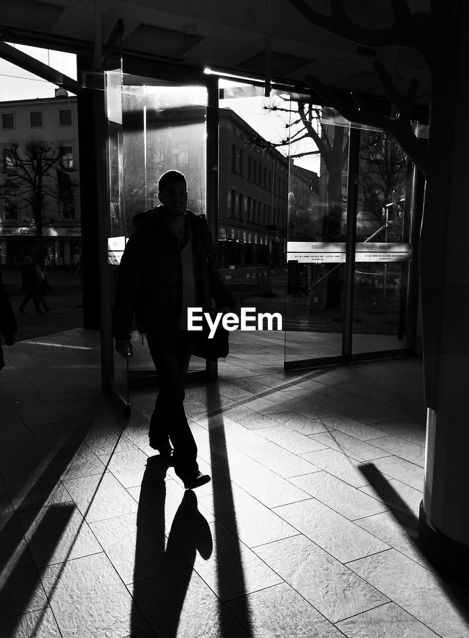 WOMAN WALKING ON STREET