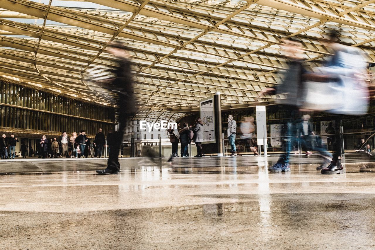 PEOPLE WALKING ON STEPS