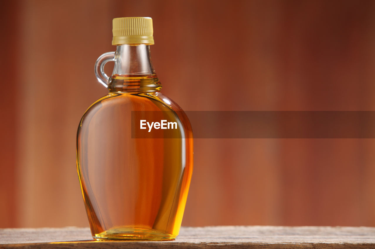 Close-up of honey in jar on table