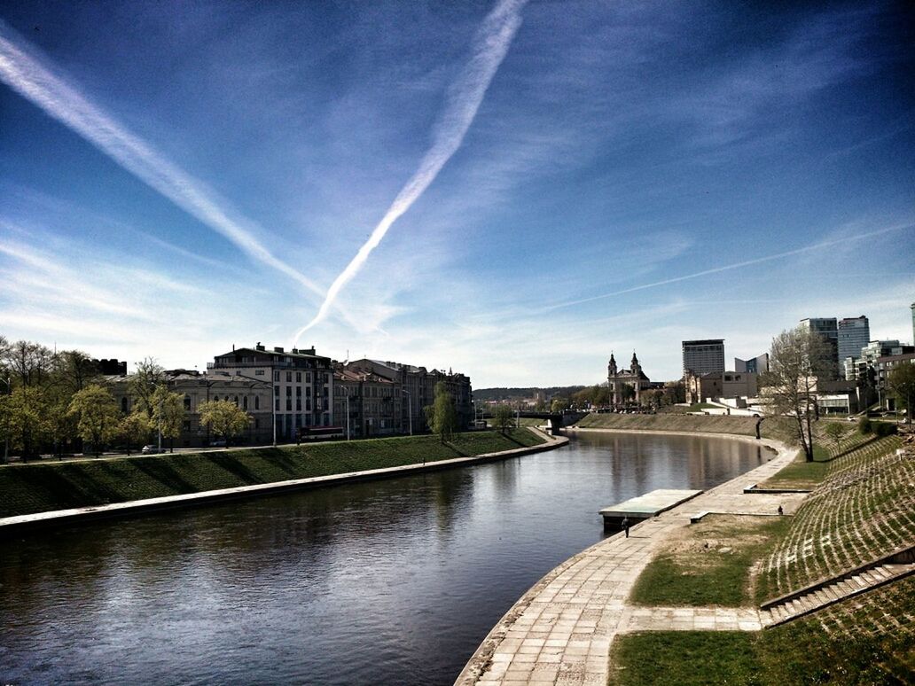 RIVER WITH CITYSCAPE IN BACKGROUND